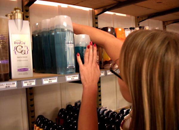 Kari stocking the shelves